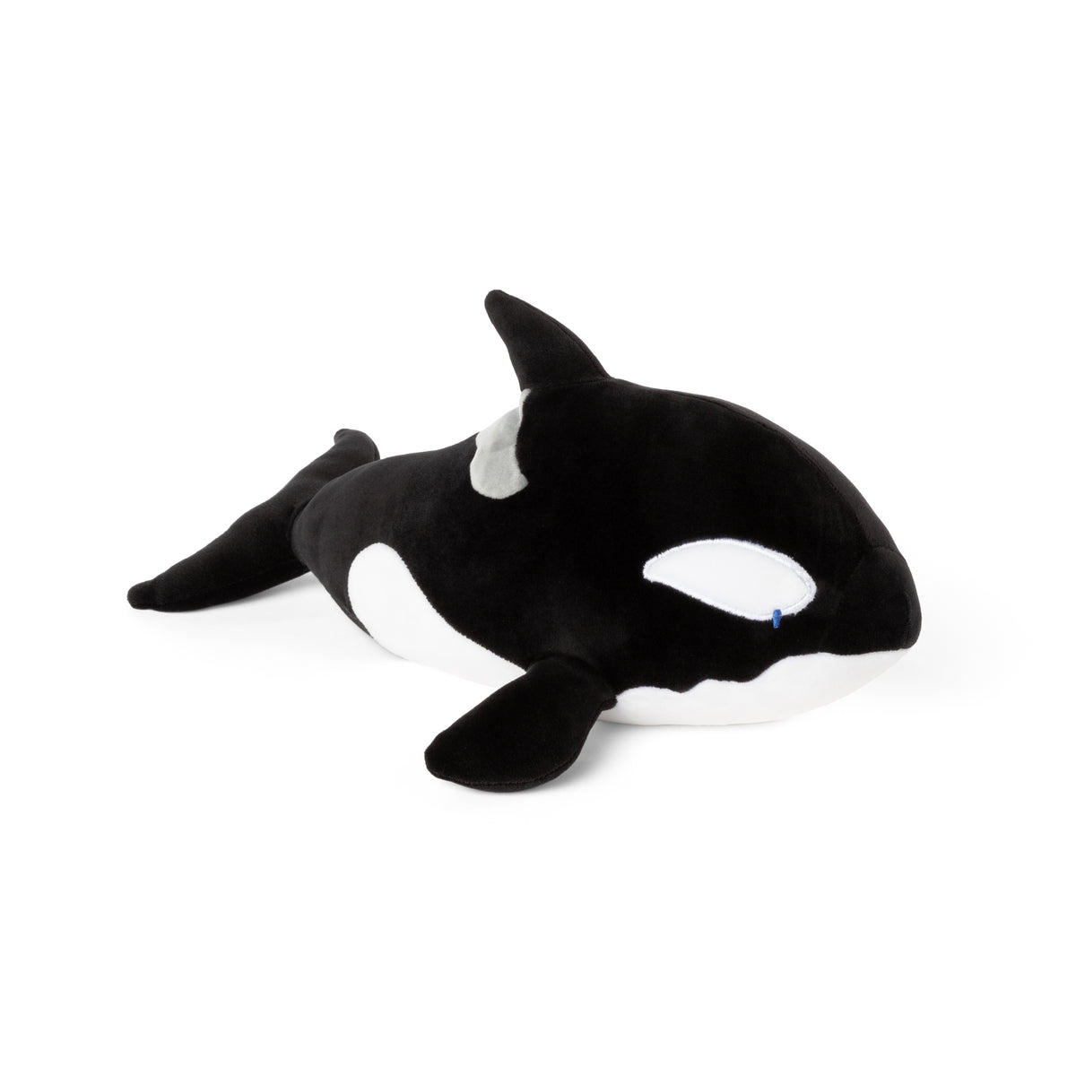 Plush toy orca whale on a white background