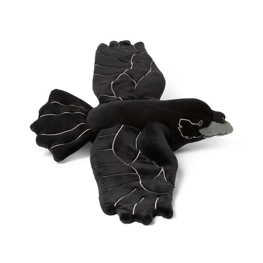 plush raven toy on a white background viewed from the side